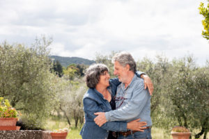Portrait of senior couple, olive trees in background, Florence, Italy Portrait of senior couple, olive trees in background, Florence, Italy